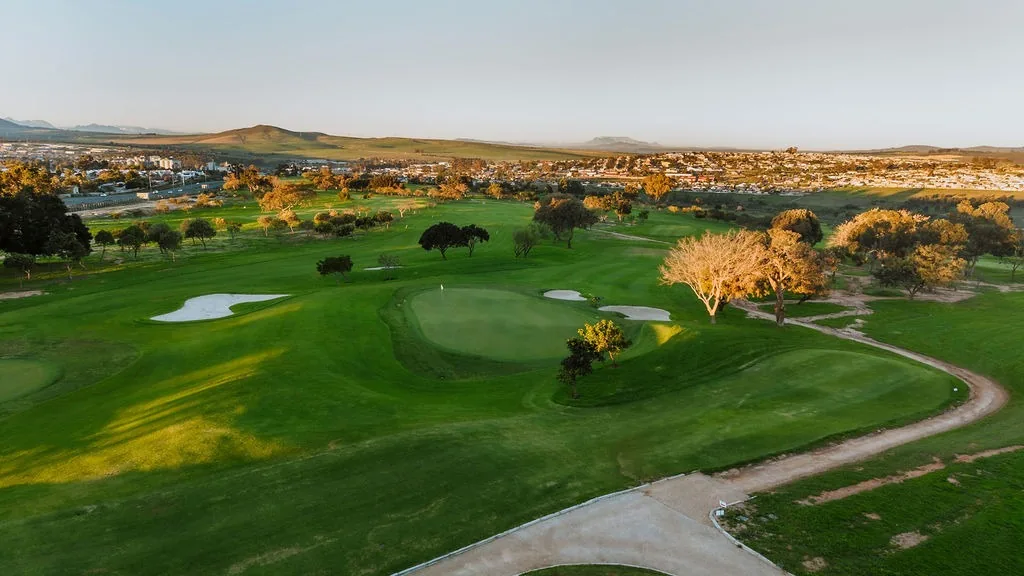 Aerial view of a Malmesbury Golf Club green with the Swartland beyond
